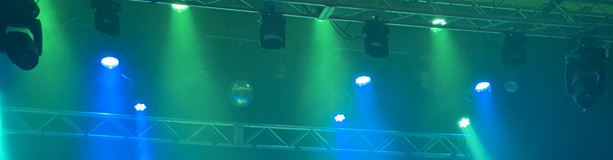 blue and green theater stage lights Rochester